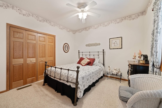 2340 Camaro Cir, Sturgis, SD 57785 - bedroom featuring light colored carpet, a closet, baseboards, and ceiling fan