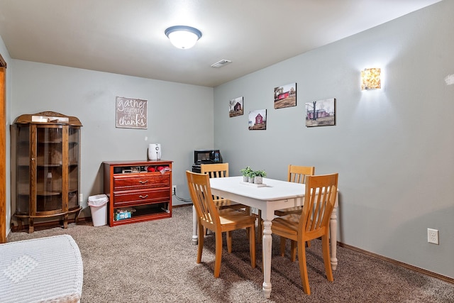 3111 Dry Creek Rd, Rapid City, SD 57703 - dining area with carpet floors and baseboards