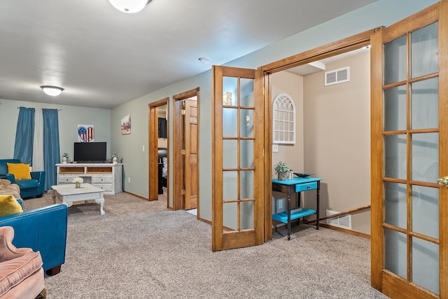 3111 Dry Creek Rd, Rapid City, SD 57703 - living room featuring carpet flooring, french doors, and baseboards