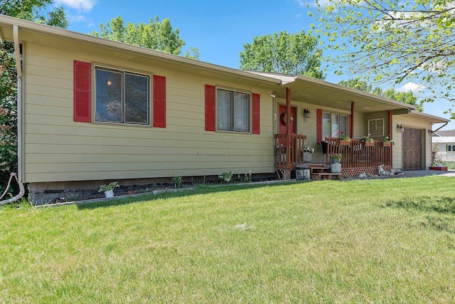 3111 Dry Creek Rd, Rapid City, SD 57703 - ranch-style home featuring an attached garage, a front lawn, and a porch