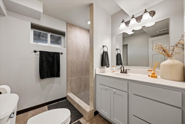2307 Colorado Dr, Sturgis, SD 57785 - full bathroom with toilet, a walk in shower, vanity, and baseboards