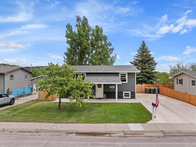 2307 Colorado Dr, Sturgis, SD 57785 - view of front facade with driveway and roof with shingles