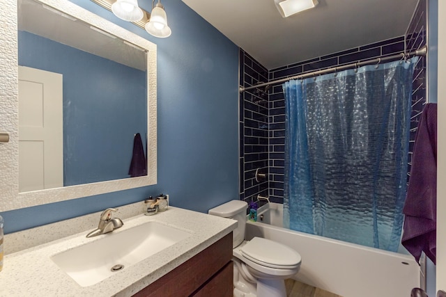 6794 Abelia St, Rapid City, SD 57703 - full bathroom with vanity, shower / bath combo with shower curtain, and toilet