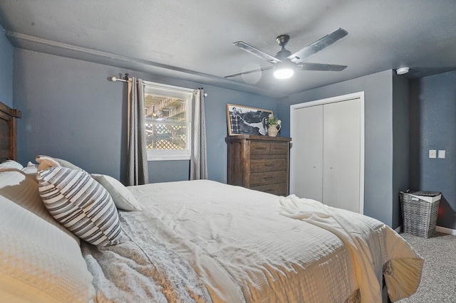 4425 Bronco Ln, Rapid City, SD 57701 - bedroom featuring carpet floors, a closet, a ceiling fan, and baseboards