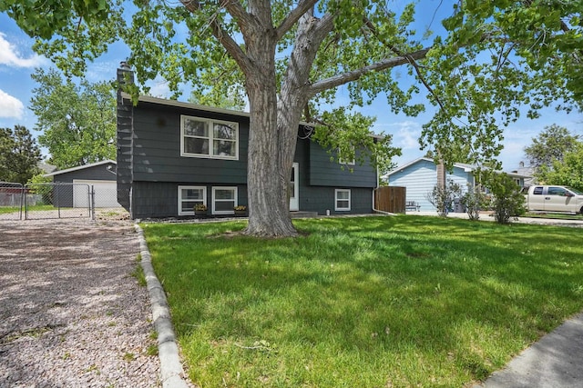 4425 Bronco Ln, Rapid City, SD 57701 - split foyer home featuring a chimney and a detached garage