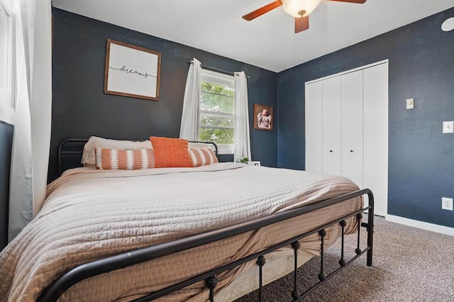 4425 Bronco Ln, Rapid City, SD 57701 - carpeted bedroom featuring a closet, baseboards, and a ceiling fan