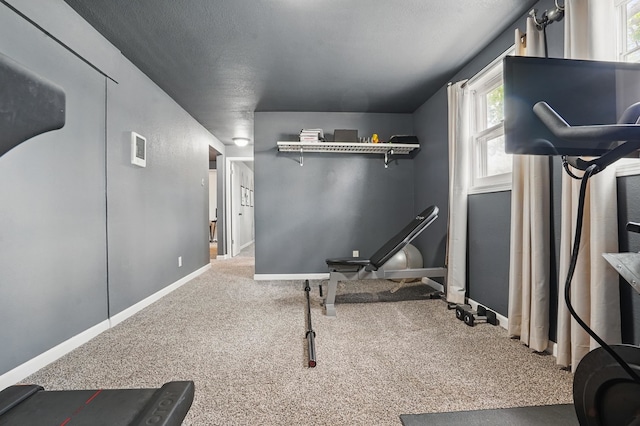 4425 Bronco Ln, Rapid City, SD 57701 - exercise room featuring carpet floors and baseboards