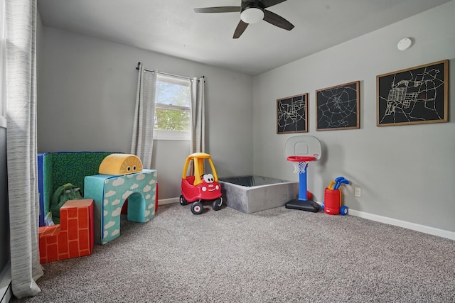 4425 Bronco Ln, Rapid City, SD 57701 - game room featuring carpet flooring, ceiling fan, and baseboards