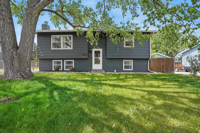 4425 Bronco Ln, Rapid City, SD 57701 - view of front facade with a chimney and entry steps