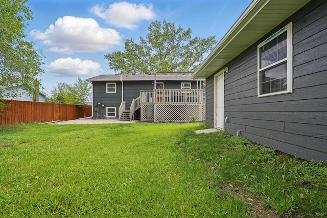 4425 Bronco Ln, Rapid City, SD 57701 - rear view of property with a deck and a patio area