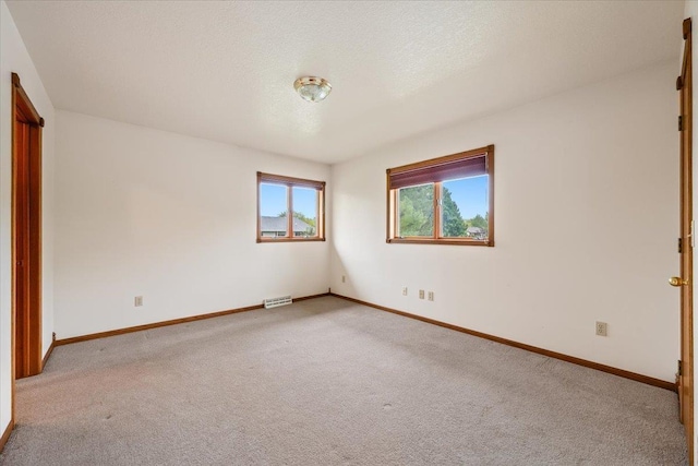 614 Englewood Ct, Spearfish, SD 57783 - carpeted spare room with baseboards