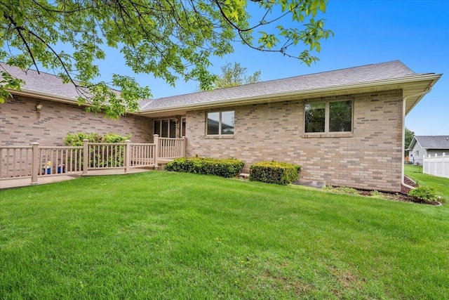 614 Englewood Ct, Spearfish, SD 57783 - back of property with a lawn and brick siding