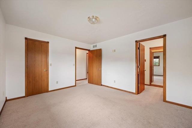 614 Englewood Ct, Spearfish, SD 57783 - unfurnished bedroom with baseboards and light colored carpet