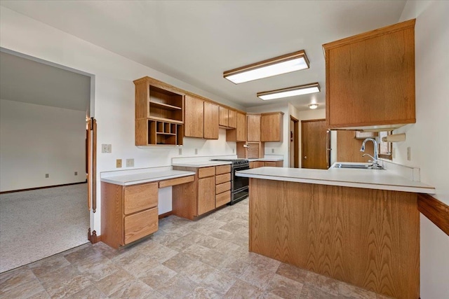 614 Englewood Ct, Spearfish, SD 57783 - kitchen featuring black stove, a sink, open shelves, a peninsula, and light countertops