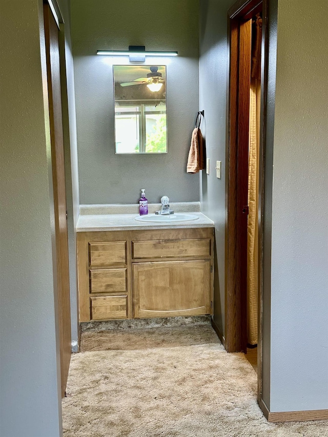 13B Statesboro Dr, Belle Fourche, SD 57717 - bathroom featuring vanity and a ceiling fan