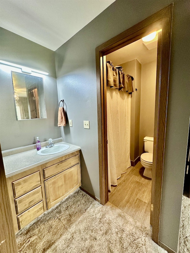 13B Statesboro Dr, Belle Fourche, SD 57717 - full bath with toilet, vanity, and a shower with curtain