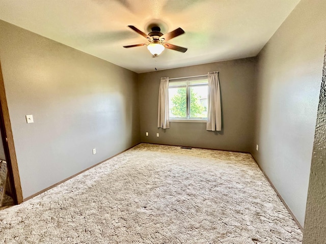 13B Statesboro Dr, Belle Fourche, SD 57717 - carpeted empty room featuring a ceiling fan and baseboards