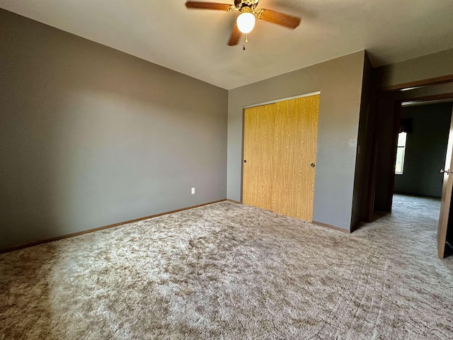 13B Statesboro Dr, Belle Fourche, SD 57717 - unfurnished bedroom with carpet, baseboards, a closet, and a ceiling fan