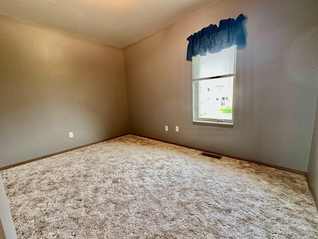 13B Statesboro Dr, Belle Fourche, SD 57717 - spare room with carpet flooring and baseboards