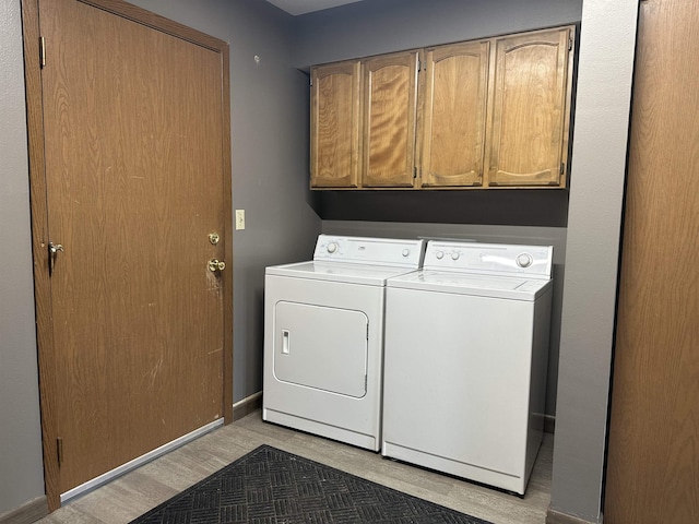 13B Statesboro Dr, Belle Fourche, SD 57717 - laundry area featuring separate washer and dryer and cabinet space