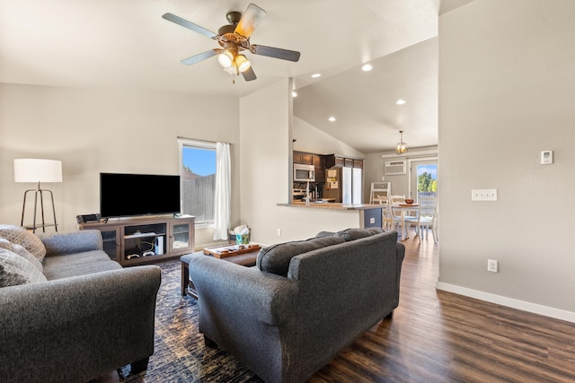 4961 Savannah St, Rapid City, SD 57703 - living room featuring ceiling fan, vaulted ceiling, dark wood-style flooring, baseboards, and a wall mounted air conditioner