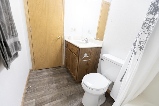 752 Bear Tooth Ct, Box Elder, SD 57719 - full bath with vanity, toilet, and wood finished floors