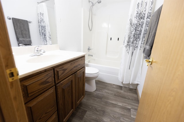 752 Bear Tooth Ct, Box Elder, SD 57719 - full bathroom featuring vanity, toilet, shower / bath combo, and wood finished floors