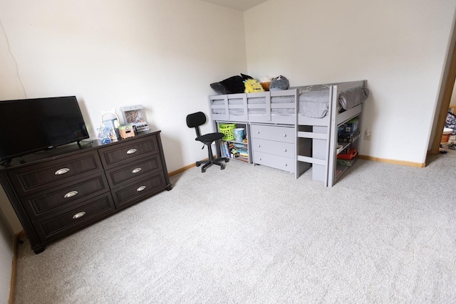 752 Bear Tooth Ct, Box Elder, SD 57719 - bedroom featuring light carpet and baseboards