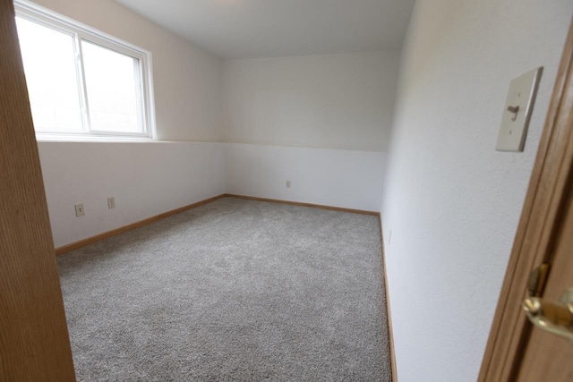 752 Bear Tooth Ct, Box Elder, SD 57719 - carpeted spare room featuring baseboards