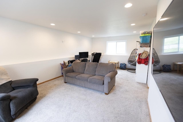 752 Bear Tooth Ct, Box Elder, SD 57719 - living room featuring light carpet, plenty of natural light, and recessed lighting