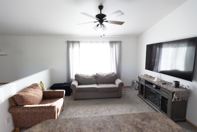 752 Bear Tooth Ct, Box Elder, SD 57719 - living area with carpet flooring and a ceiling fan