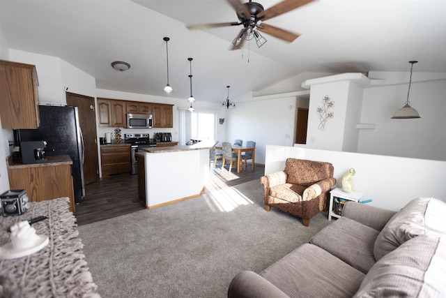752 Bear Tooth Ct, Box Elder, SD 57719 - living area featuring lofted ceiling, ceiling fan, and dark carpet