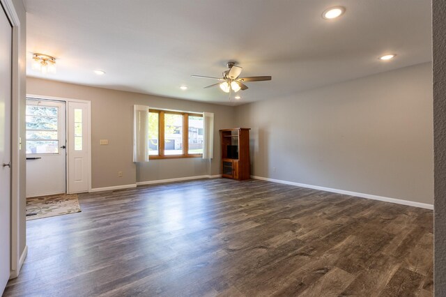 1433 Lookout Valley Ct, Spearfish, SD 57783 - unfurnished living room with a ceiling fan, dark wood-style flooring, recessed lighting, and baseboards