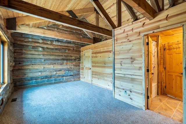 23470 Mineral Ln, Hill City, SD 57745 - carpeted empty room featuring wood walls and wood ceiling