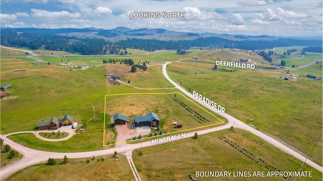 23470 Mineral Ln, Hill City, SD 57745 - overview of rural landscape with property parcel outlined, agricultural land, and mountains