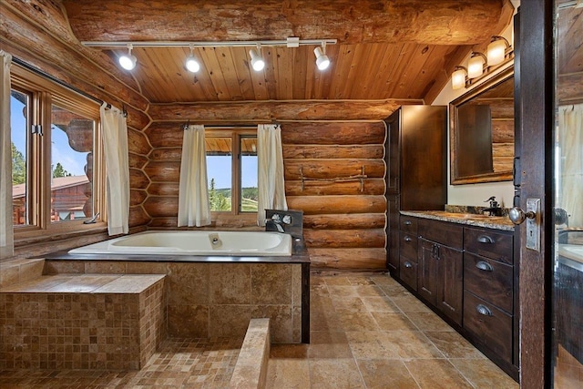 22231 Nahant Rd, Lead, SD 57754 - bathroom with track lighting, a bath, vanity, wooden ceiling, and rustic walls