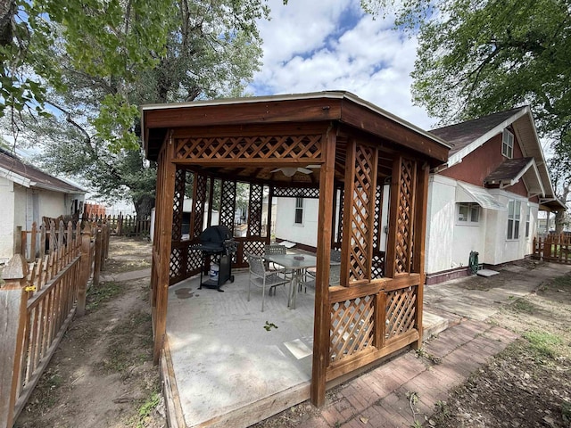 304 6th Ave, Edgemont, SD 57735 - wooden deck featuring a grill, a patio area, outdoor dining area, and a gazebo