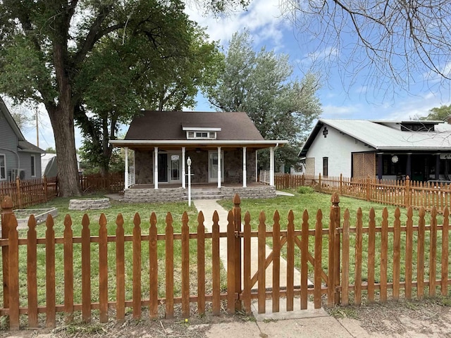 304 6th Ave, Edgemont, SD 57735 - view of front of home with a porch and stone siding
