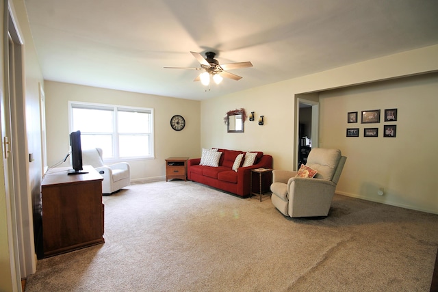 1033 Boulevard St, Sturgis, SD 57785 - carpeted living room featuring a ceiling fan and baseboards