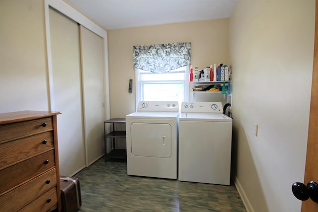 1033 Boulevard St, Sturgis, SD 57785 - laundry area featuring washing machine and dryer, dark wood-style flooring, and baseboards