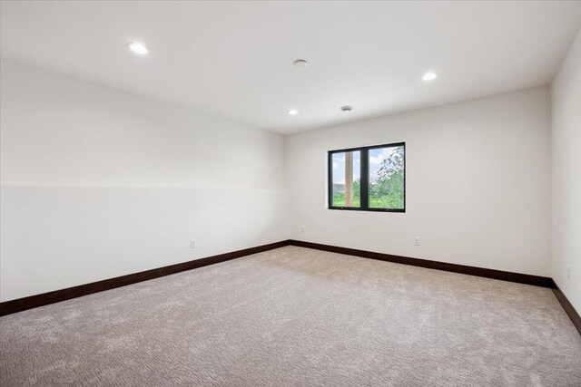2431 Malibu Loop, Sturgis, SD 57785 - carpeted empty room featuring baseboards and recessed lighting