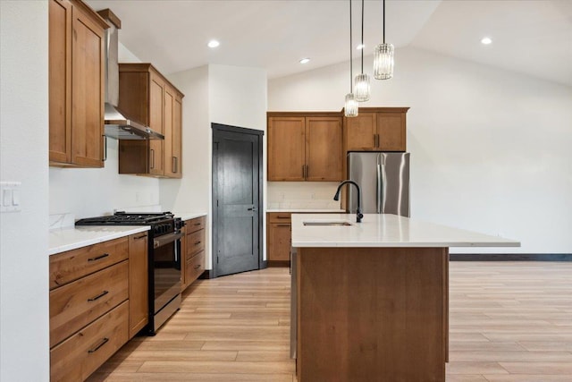 2431 Malibu Loop, Sturgis, SD 57785 - kitchen with range with gas stovetop, freestanding refrigerator, a sink, light wood finished floors, and lofted ceiling