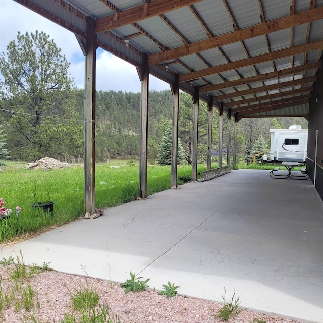 12748 Beaver Creek Rd, Custer, SD 57730 - view of patio / terrace featuring a view of trees