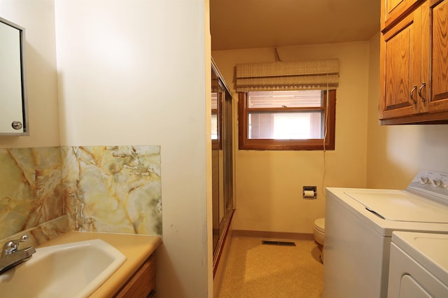 1609 Spruce St, Sturgis, SD 57785 - washroom featuring washer and dryer