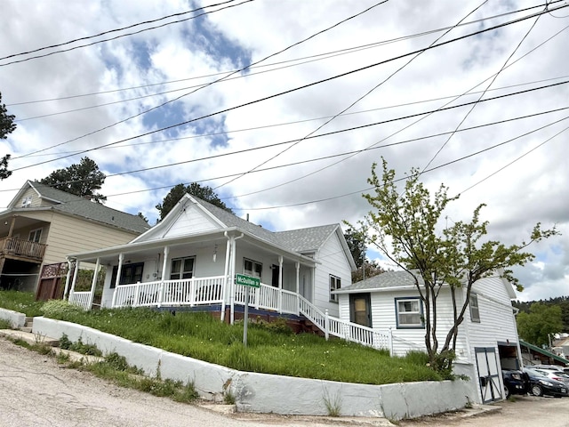 403 Mcquillan Ave, Lead, SD 57754 - view of front of house featuring covered porch