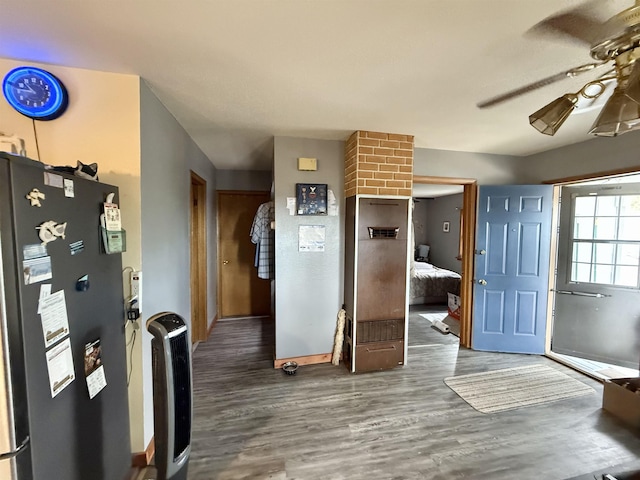 403 Mcquillan Ave, Lead, SD 57754 - foyer entrance featuring wood finished floors, ceiling fan, and baseboards