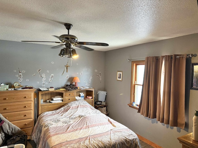 403 Mcquillan Ave, Lead, SD 57754 - bedroom with a textured ceiling and ceiling fan