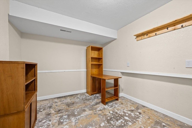 824 W Mcclellan St, Lead, SD 57754 - finished basement featuring baseboards and a textured ceiling