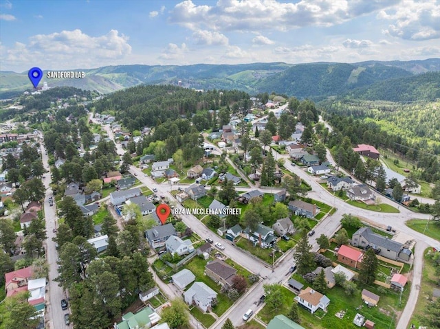 824 W Mcclellan St, Lead, SD 57754 - aerial overview of property's location with mountains and a forest