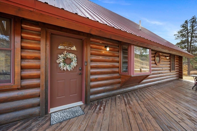 15377 Ridgeview Trl, Piedmont, SD 57783 - view of exterior entry with metal roof and log siding